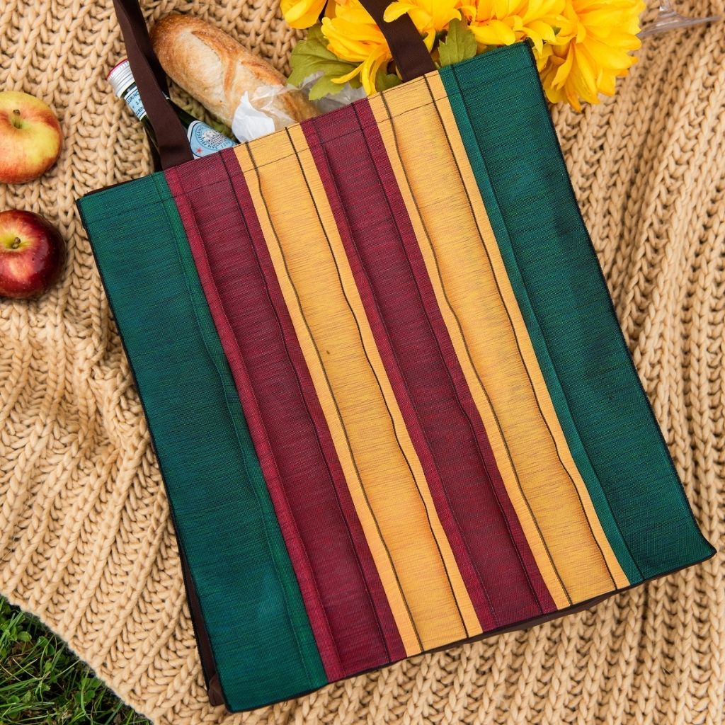 Close up image of woven fabric, Bold Deep Green, Red and Golden Yellow Stripes, Japanese Vibe, Super Durable Fabric, Double Stitched Handles, Shoulder Straps, Heavy Duty Stitching on Corners and Seams. Long lasting Sustainable Tote Bags ShimaShima Bags
