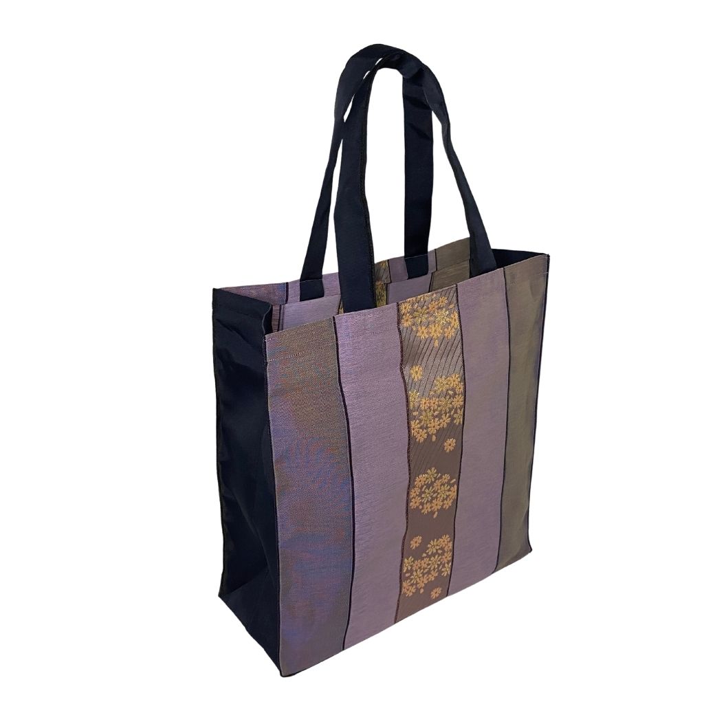 Lovely Purple and Lavender Striped Large Tote Bag with Purple and Pink Floral Designs on Center Stripe. Fabric Made in Japan| Boxy Bottom Tote Bag, Small Batch Production| Handbags Made in the USA| Durable, High Quality, Ultra Light Tote Bags| Made in the Finger Lakes, NY | Totes for  Women, Teachers, Moms| Best Totes for Work, Beach, Market, School, College|  Shop our Online Store ShimaShima Bags